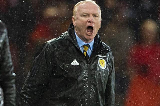 Alex McLeish barks out instructions on a rain-soaked night at Hampden which ended with a morale-boosting win for Scotland over Albania. Picture: SNS