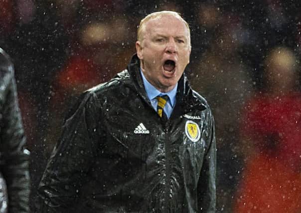 Alex McLeish barks out instructions on a rain-soaked night at Hampden which ended with a morale-boosting win for Scotland over Albania. Picture: SNS