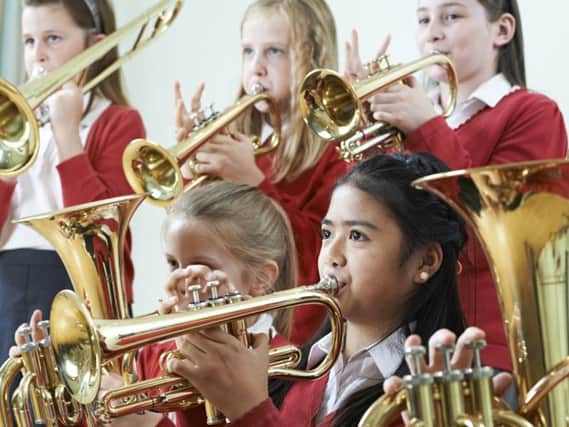 Many councils now charge children to learn instruments at school.