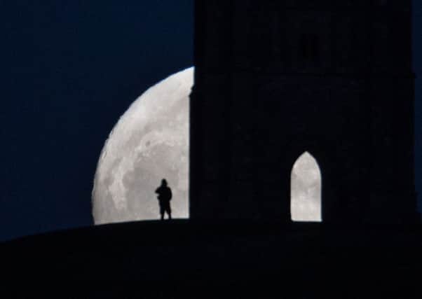 A 'wolf moon' rises over Glastonbury Tor (Picture: Matt Cardy/Getty Images)