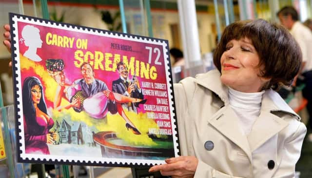 Fenella Fielding launching a series of Royal Mail stamps in 2008 celebrating the 50th anniversary of the Carry On films. Picture: PA