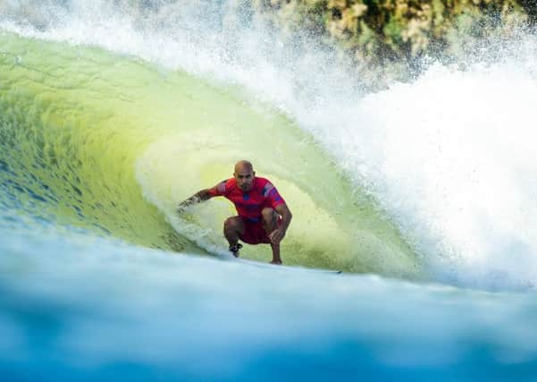 Kelly Slater slides into the green room at the Surf Ranch Pro