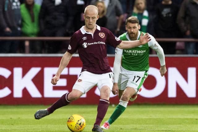 Martin Boyle and Steven Naismith vie for the ball - the pair are both in the combined team. Picture: SNS Group
