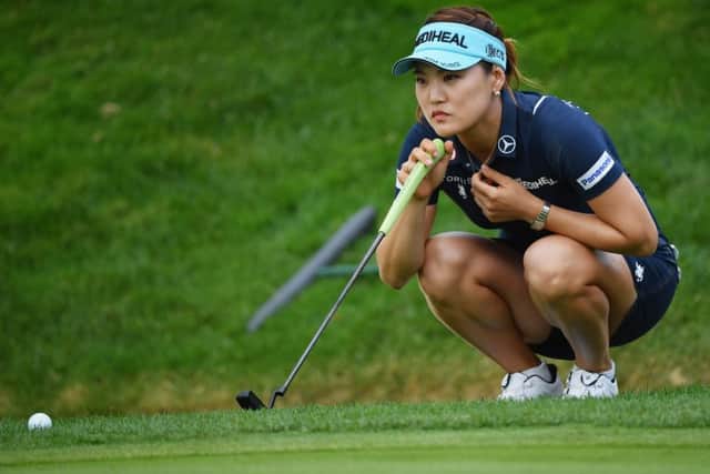 So Yeon Ryu of South Korea lines up a putt during day one of the Evian Championship. Picture: Stuart Franklin/Getty Images