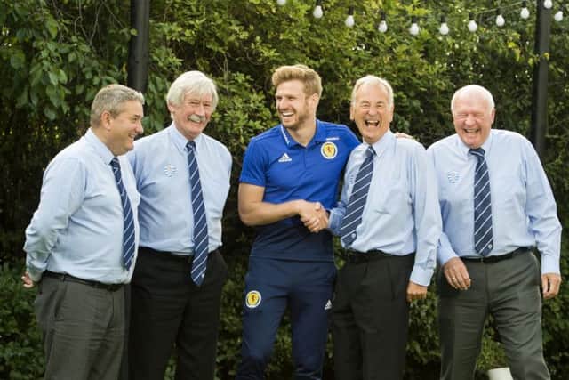 Stuart Armstrong (centre) meets Dyce Boys Club reps Ronnie Cromar, Eric Mannall, Len Nicol and George Anderson. Picture: SNS Group