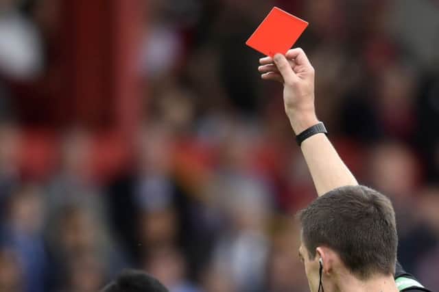 The SFA is seeking clarification over red card laws. Picture: SNS Group