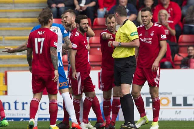 Aberdeen have found the SFA's explanation of why Michael Devlin's red card has not been rescinded "unacceptable". Picture: SNS/Bill Murray