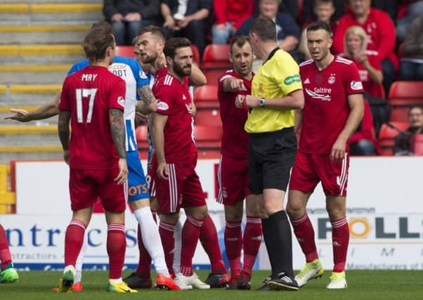 Aberdeen have found the SFA's explanation of why Michael Devlin's red card has not been rescinded "unacceptable". Picture: SNS/Bill Murray