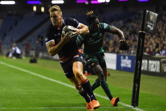 Edinburgh wing Duhan van der Merwe crosses the line to score the opening try of the night at BT Murrayfield. Picture: SNS