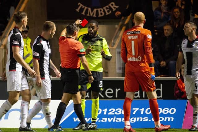 Referee Andrew Dallas sends off Celtic's Olivier Ntcham. Picture: SNS