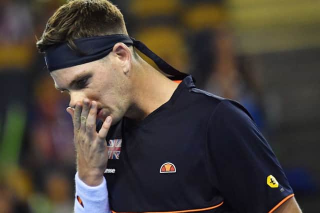 An out-of-sorts Cameron Norrie shows his frustration as the match slips away from him. Picture: SNS.