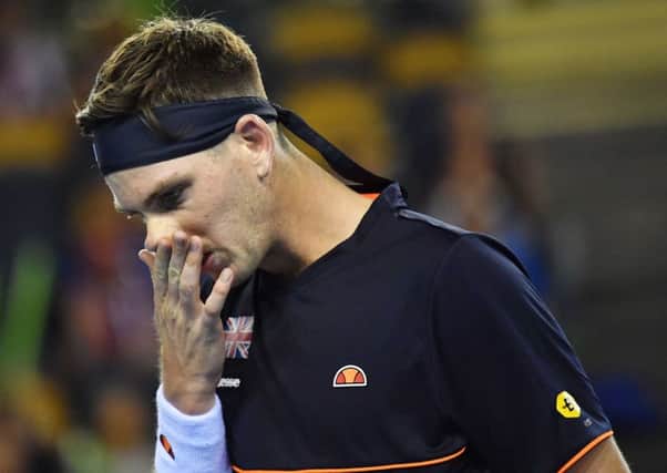 An out-of-sorts Cameron Norrie shows his frustration as the match slips away from him. Picture: SNS.