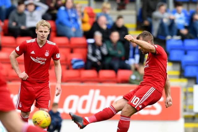 Niall McGinn scores Aberdeen's equaliser. Pic: SNS/Craig Foy