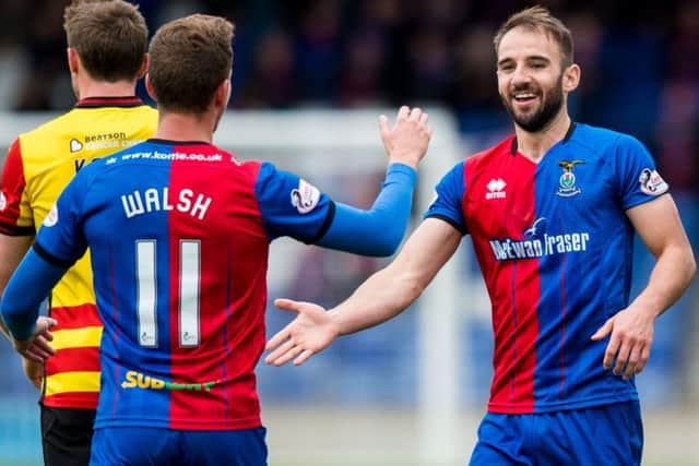 Inverness's Sean Welsh (right) celebrates his penalty with Tom Walsh. Pic: SNS/Ross Parker