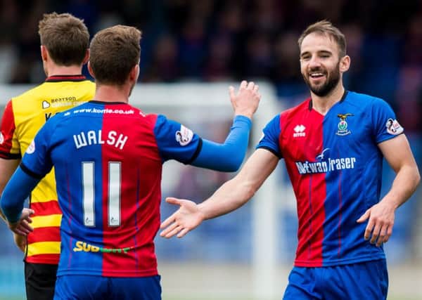Inverness's Sean Welsh (right) celebrates his penalty with Tom Walsh. Pic: SNS/Ross Parker