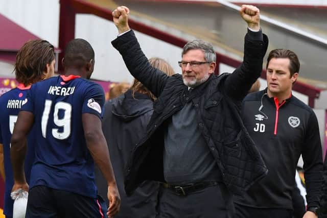 Hearts manager Craig Levein celebrates his team's win at the end of the match. Picture: SNS