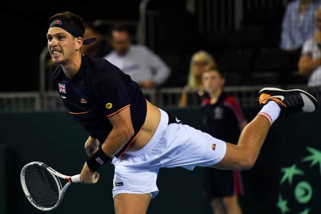 British No 2 Cameron Norrie serves on his way to beating Sanjar Fayziev and securing Davis Cup victory over Uzbekistan in Glasgow. Picture: Bill Murray/SNS