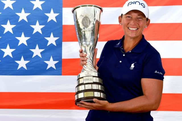 Angela Stanford of the United States poses with the trophy after victory in the Evian Championship in Evian-les-Bains, France. Picture: Stuart Franklin/Getty Images