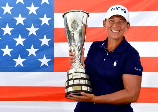 Angela Stanford of the United States poses with the trophy after victory in the Evian Championship in Evian-les-Bains, France. Picture: Stuart Franklin/Getty Images