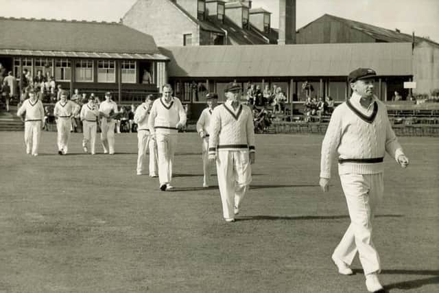 Don Bradman leads the Australian team out at Mannofield, Aberdeen. Picture: Herald & Times Archive