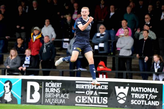 Zak Rudden celebrates his opener. Picture Michael Gillen.