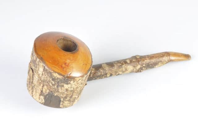 The simple wooden pipe belonging to Queen Victoria's devoted servant John Brown. PIC: Contributed.