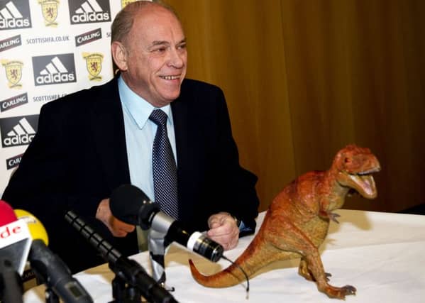 Former SFA president George Peat shares a joke with the media at a Hampden press cionference in December 2010. Picture: SNS Group