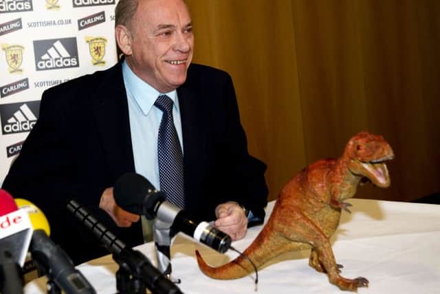 Former SFA president George Peat shares a joke with the media at a Hampden press cionference in December 2010. Picture: SNS Group