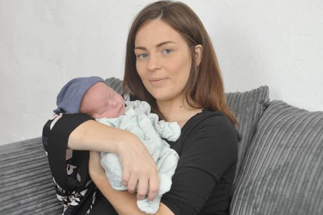 Nicola Abbott and baby Archer. Picture: SWNS