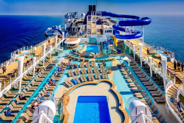 Swimming pools, sun loungers and a flume on board the Norwegian Bliss cruise ship