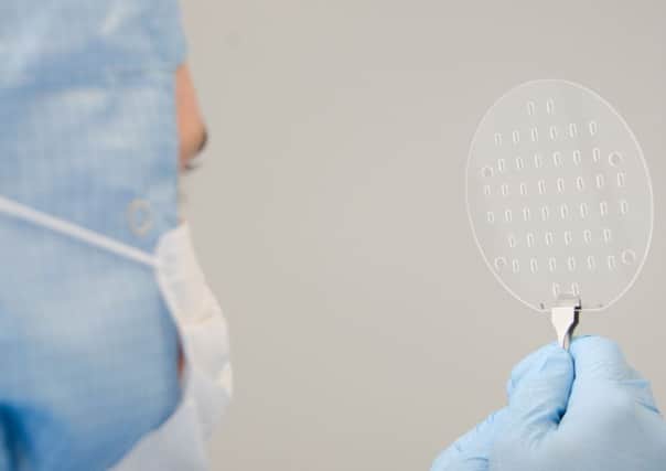 Optoscribe produces circuit components like this laser-inscribed wafer. Picture: Contributed