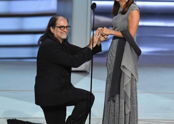 Glenn Weiss (L), winner of the Outstanding Directing for a Variety Special award for 'The Oscars,' proposes marriage to his partner Jan Svendsen. Picture: Kevin Winter/Getty Images