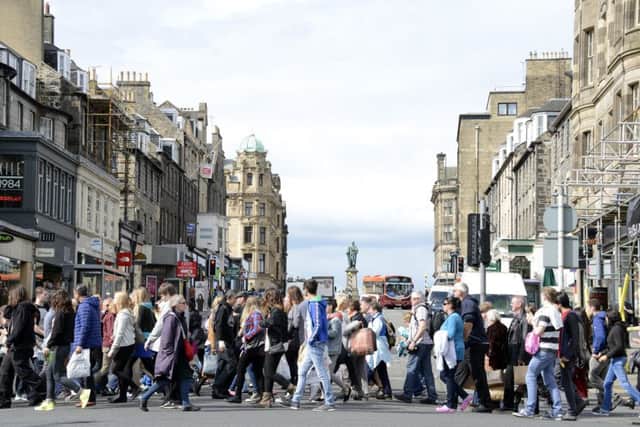Shoppers on Princes Street in Edinburgh. The Scottish capital is mooted to become Scotland's biggest city by 2032