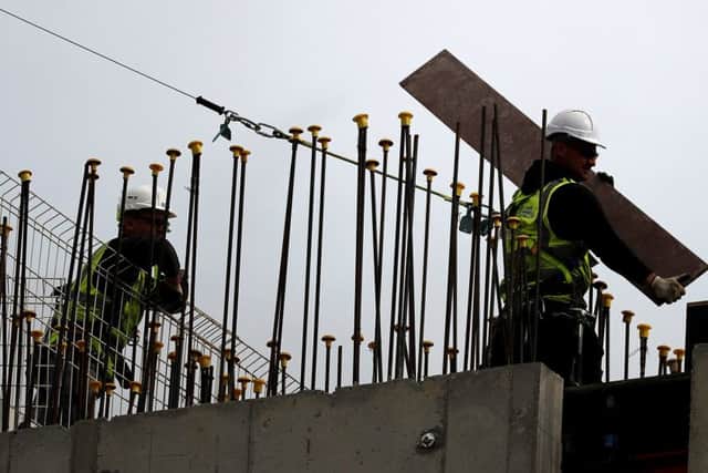 The Migration Advisory Committee has advised the government in a new report, to restrict the number of lower skilled EU workers (which would include construction workers) allowed to enter the UK after Britain's Brexit split from the EU. Picture: AP Photo/Frank Augstein
