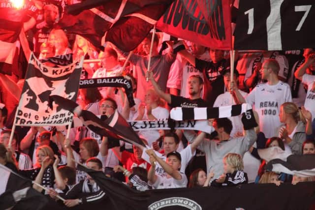 Rosenborg fans show their support during a Norwegian league match at the Lerkendal Stadion. Picture: Getty Images