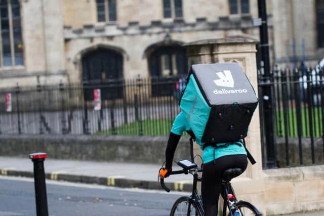 Drivers say they have been offered incentives to go out on their bikes in high winds.