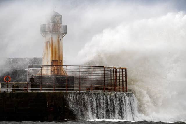 Waves crash against the harbour wall as Storm Ali hits land in Ardrossan,Scotland. Severe gales that hit more than 100mph caused road, rail and ferry travel disruption. Picture: Jeff J Mitchell/Getty Images