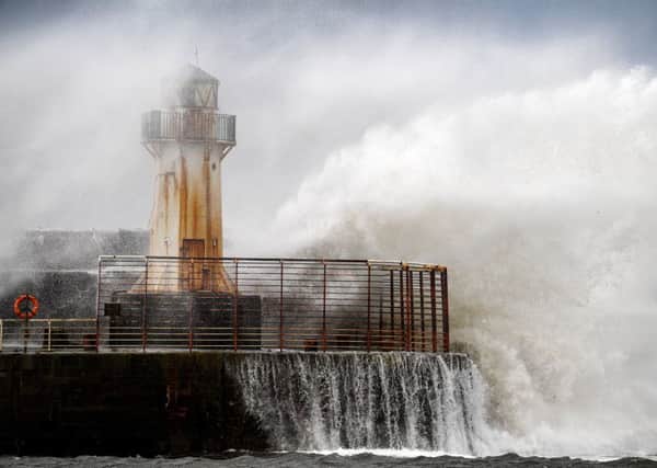 Waves crash against the harbour wall as Storm Ali hits land in Ardrossan,Scotland. Severe gales that hit more than 100mph caused road, rail and ferry travel disruption. Picture: Jeff J Mitchell/Getty Images