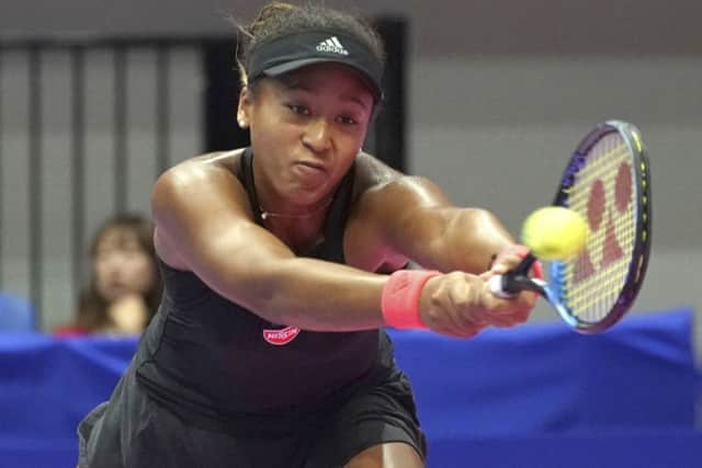 Naomi Osaka returns a shot during her win over Dominika Cibulkova at the Pan Pacific Open in Tokyo. Picture: Eugene Hoshiko/AP