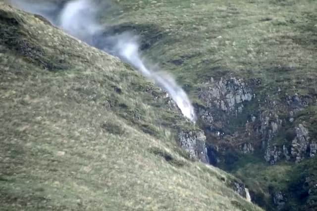 Video grab shows a waterfall blowing uphill as Storm Ali batters Scotland. Picture: Centre Press