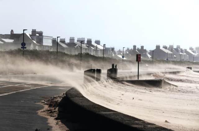 Strong winds blow sand across the seafront at Troon in Ayrshire where the car chase took place. Picture: Andrew Milligan/PA Wire
