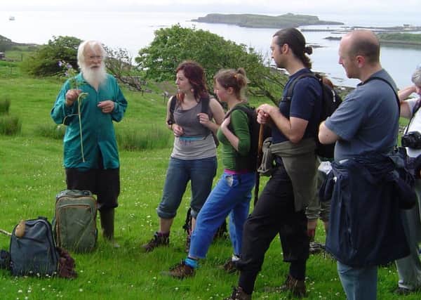 Tom Forsyth talking to visitors to Eigg in 2005