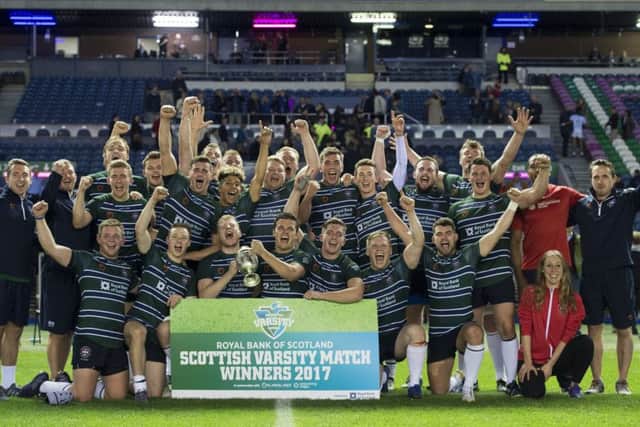 The University of Edinburgh players celebrate their victory over their St Andrews counterparts in last year's Scottish Varsity match. Picture: SNS/SRU