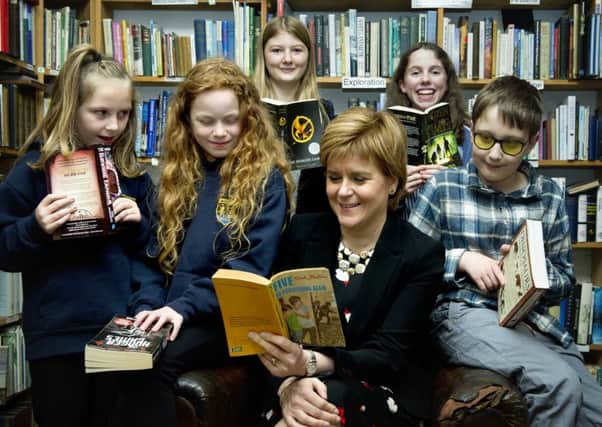 Young readers share their favourite books with the First Minister Nicola Sturgeon at the Wigtown Book Festival. Picture: Colin Hattersley