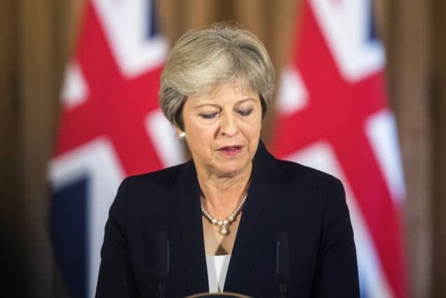 British Prime Minister Theresa May makes a statement on Brexit negotiations with the European Union. Picture: Paul Grover/AP