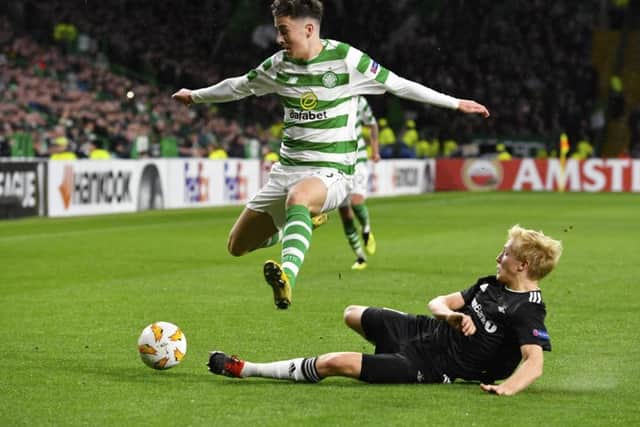Mikey Johnston tries to evade a challenge from Rosenborg's Birger Meling. Picture: SNS Group