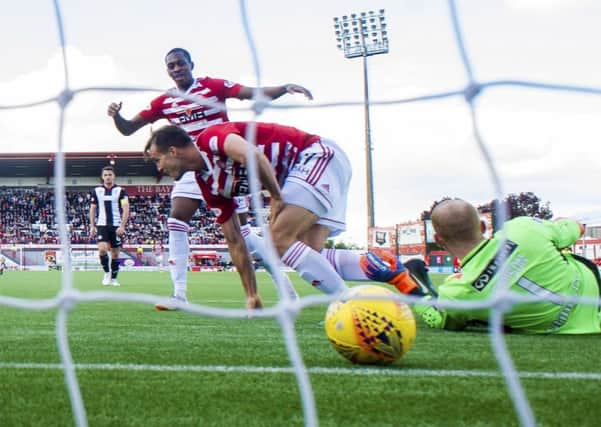 Fredrik Brustad wheels away after netting the opening goal for Hamilton. Picture: SNS Group