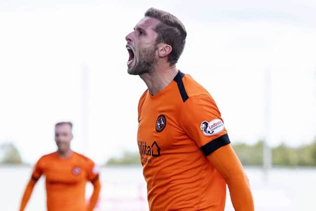 Pavol Safranko celebrates scoring Dundee United's opening goal at Falkirk. Picture: Roddy Scott/SNS