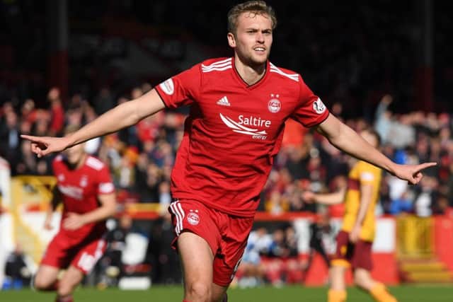 James Wilson celebrates his first goal for Aberdeen. Picture: Craig Williamson/SNS
