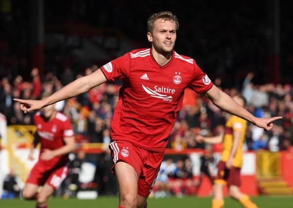 James Wilson celebrates his first goal for Aberdeen. Picture: Craig Williamson/SNS